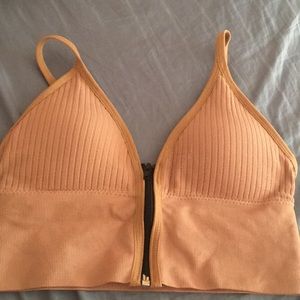 This is a zip up crop top size small in pink!